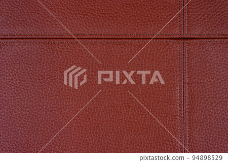 Red leather, leatherette texture background wtih decorative stich Red leather, leatherette texture background wtih decorative stich 94898529
