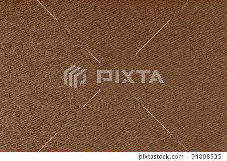 Texture of brown fabric diagonal weave pattern. Decorative textile background 94898535