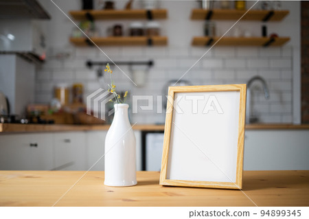 empty frame on modern kitchen table mock up space for your text empty frame on modern kitchen table mock up space for your text 94899345