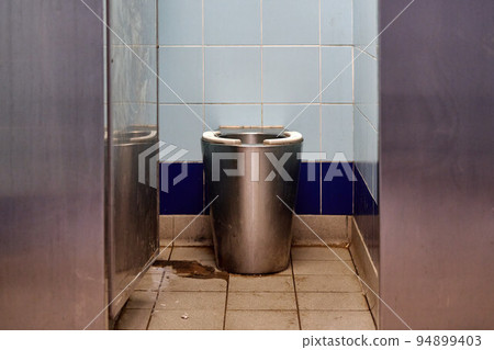 A stainless steel public toilet 94899403