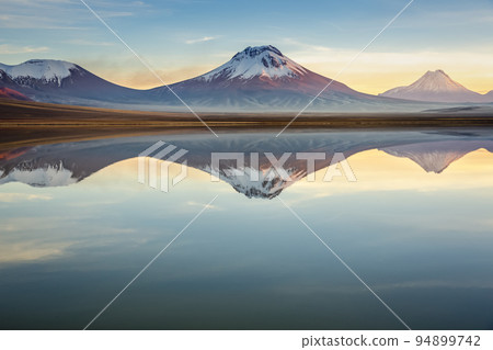 Idyllic Lake Lejia reflection and volcanic landscape in Atacama desert, Chile 94899742