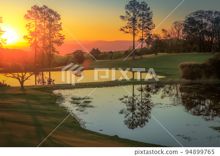 Southern Brazil countryside and lake landscape at peaceful sunset 94899765