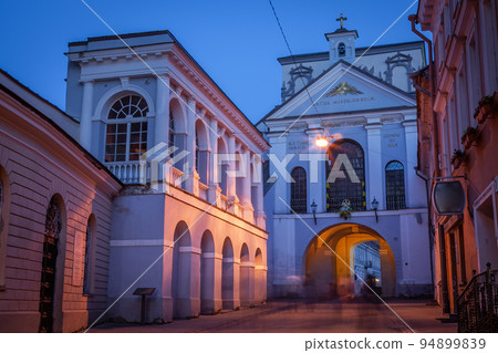 Vilnius old town, gates of dawn street illuminated at night, Lithuania Vilnius old town, gates of dawn street illuminated at night, Lithuania 94899839