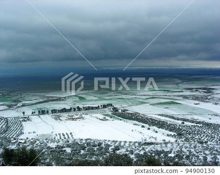 Snowy valley seen from the mountain Snowy valley seen from the mountain 94900130