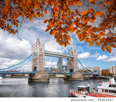 Tower Bridge with autumn leaves in London, England, UK Tower Bridge with autumn leaves in London, England, UK 94901647