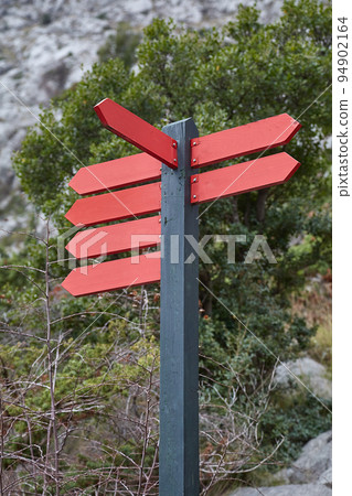 Direction signs on a trail 94902164