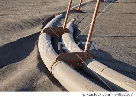 Pipes running on the ground 94902167