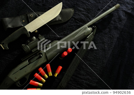 Weapon on black cloth Weapon on black cloth 94902636