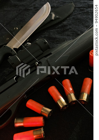 Weapon on black cloth Weapon on black cloth 94902654
