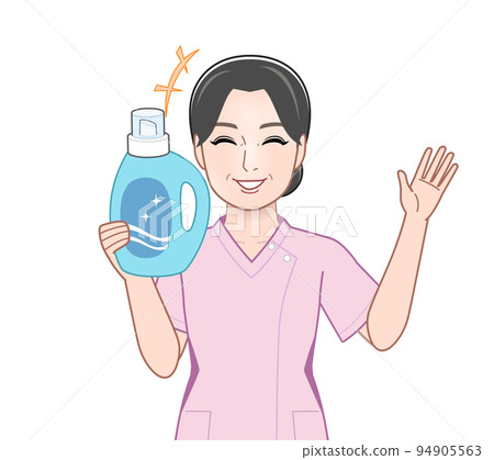 Young housewife with a bottle of laundry detergent Young housewife with a bottle of laundry detergent 94905563