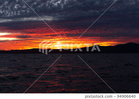 Colorful ocean beach sunrise. 94906640