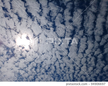 Mysterious landscape of cloudy sun and blue sky 94906697