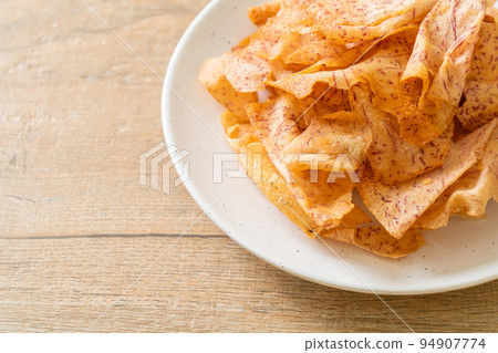 Taro Chips - fried or baked sliced taro 94907774