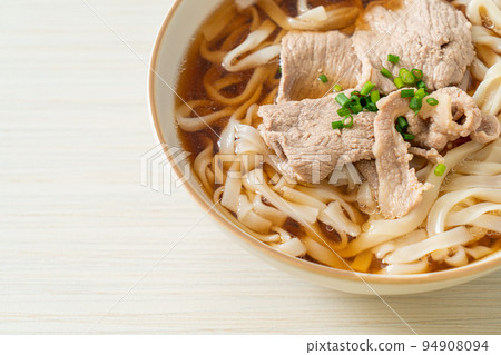 homemade udon noodles with pork in soy or shoyu soup homemade udon noodles with pork in soy or shoyu soup 94908094