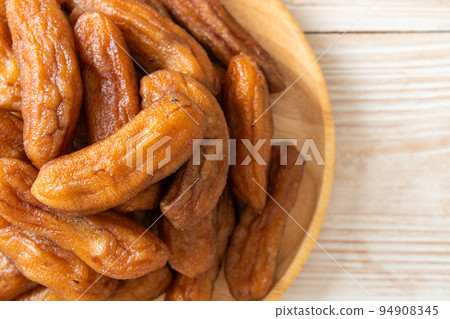 sun dried banana on plate sun dried banana on plate 94908345