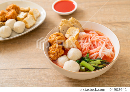small flat rice noodles with fish balls and shrimp balls in pink soup, Yen Ta Four or Yen Ta Fo small flat rice noodles with fish balls and shrimp balls in pink soup, Yen Ta Four or Yen Ta Fo 94908641