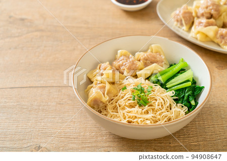 dried egg noodles with pork wonton or pork dumplings without soup 94908647