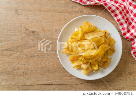 Banana Chips - fried or baked sliced banana 94908791