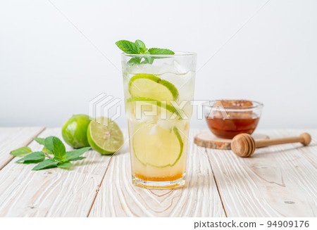 iced honey and lime soda with mint iced honey and lime soda with mint 94909176