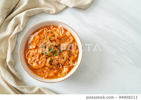 Korean udon ramen noodles with pork in kimchi soup Korean udon ramen noodles with pork in kimchi soup 94909211
