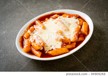 Korean rice cake in spicy Korean sauce with cheese, Cheese Tokpokki, Tteokbokki with Cheese Korean rice cake in spicy Korean sauce with cheese, Cheese Tokpokki, Tteokbokki with Cheese 94909268