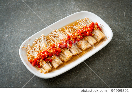 steamed golden needle mushroom or enokitake with soy sauce, chilli and garlic steamed golden needle mushroom or enokitake with soy sauce, chilli and garlic 94909891