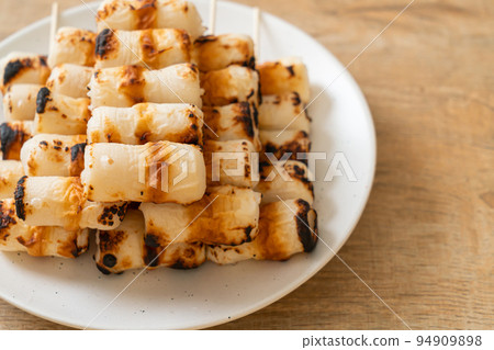 grilled tube shaped fish paste cake skewe or tube squid skewer grilled tube shaped fish paste cake skewe or tube squid skewer 94909898
