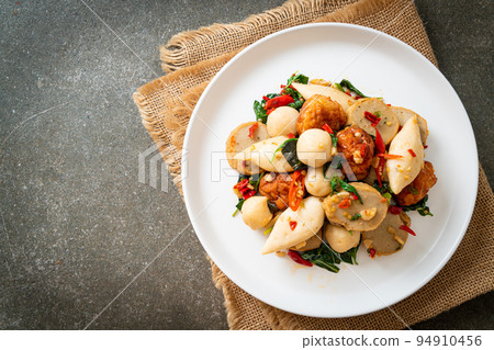 Spicy stir fried fish balls 94910456