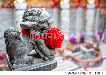 Lion Rock stone statues in chinese temple 94911011