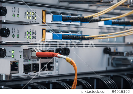 Datacenter Network Devices Switch With Connected Optical Patch Cord Cable  94916303