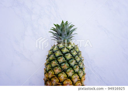 pineapple on the white background pineapple on the white background 94916925