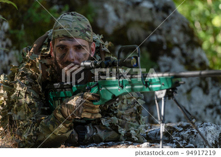 Sniper in Camouflaged Suit with Rifle Stock Image - Image of