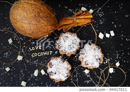 coconut muffins on a black background 94917811