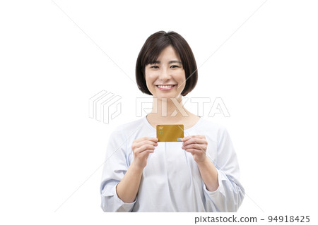 A young woman with a credit card A young woman with a credit card 94918425