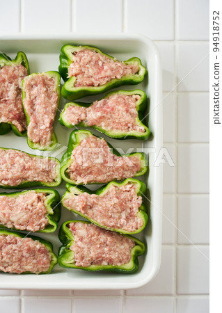 Stuffed peppers during cooking Stuffed peppers during cooking 94918752