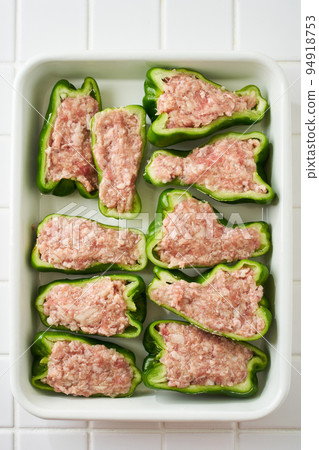 Stuffed peppers during cooking Stuffed peppers during cooking 94918753