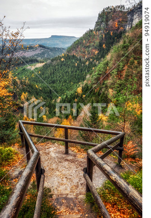 Lookout in autumn forest at Bohemian Switzerland Lookout in autumn forest at Bohemian Switzerland 94919074