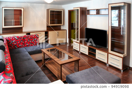 new furniture in living room with sofa, table and Tv 94919098