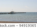 Photo seascape with a pier and a ship. Kherson region, the town of Skadovsk. 94919365
