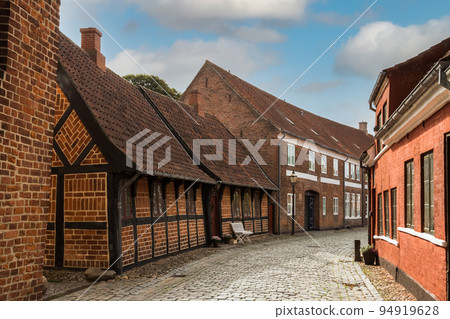 Street and traditional houses in old town of Ribe, Jutland, Denmark Street and traditional houses in old town of Ribe, Jutland, Denmark 94919628