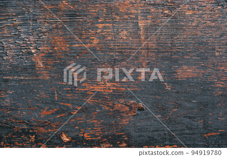 Old board. Wooden texture. Dark background. Grunge dirty brown surface of floor with black spots and scratches copy space for text logo. 94919780