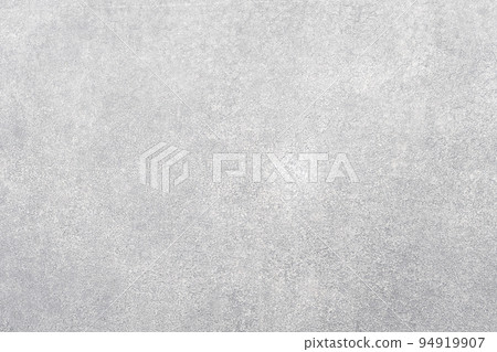 Stony background. Concrete wall. Light surface. Textured grain cementum with small stones covering white paint copy space for text logo. Stony background. Concrete wall. Light surface. Textured grain cementum with small stones covering white paint copy space for text logo. 94919907