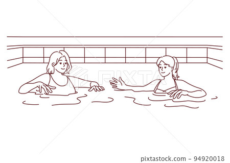 Women in swimsuits swim in pool Women in swimsuits swim in pool 94920018