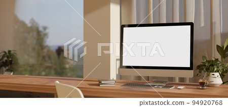 Scandinavian home workspace against the window with PC computer mockup on wood table 94920768