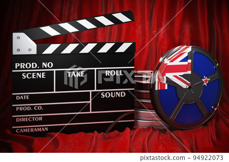 New Zealand cinematography, film industry, cinema in New Zealand. Clapperboard with and film reels on the red fabric, 3D rendering 94922073