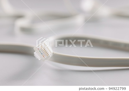 Ethernet LAN carrier and cable on a gray background, wifi Ethernet LAN carrier and cable on a gray background, wifi 94922799