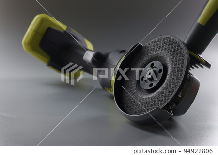 Cordless new hand sander on a gray background Cordless new hand sander on a gray background 94922806