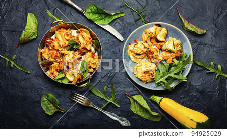 Delicious fried zucchini, top view Delicious fried zucchini, top view 94925029
