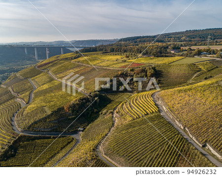 Aerial view Famous German Wine Region Moselle River Lay and Guels village Autumn Fall colors Aerial view Famous German Wine Region Moselle River Lay and Guels village Autumn Fall colors 94926232