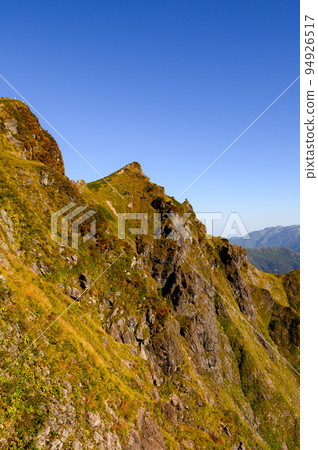 Mt. Tanigawadake in autumn, the summit visible from Nishiguro Ridge Mt. Tanigawadake in autumn, the summit visible from Nishiguro Ridge 94926517
